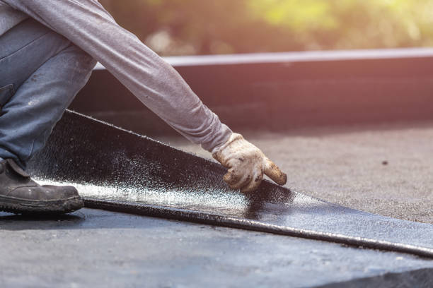 Professional Basement Waterproofing technician working in Fulton, NY